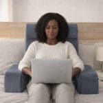 Woman_On_Laptop_HeadRest_Alignment_System